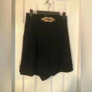 Chic Black Women's Shorts with Gold Accent